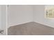 Simple bedroom with wood-look floors and a window at 10330 Sw 99Th Ln, Ocala, FL 34481