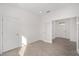 Spacious entryway with wood-look floors and access to other rooms at 10330 Sw 99Th Ln, Ocala, FL 34481