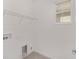Laundry room with shelving and built in storage at 10330 Sw 99Th Ln, Ocala, FL 34481