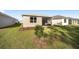 Home with screened porch and grassy backyard at 10338 Sw 99Th Ln, Ocala, FL 34481