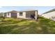 Home with screened porch and grassy backyard at 10338 Sw 99Th Ln, Ocala, FL 34481