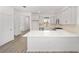 Modern kitchen with white cabinets and quartz countertops at 10338 Sw 99Th Ln, Ocala, FL 34481