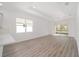 Open living area with kitchen and sliding glass doors at 10338 Sw 99Th Ln, Ocala, FL 34481