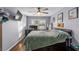 Spacious bedroom with hardwood floors and ceiling fan at 1416 Se 17Th Ave, Ocala, FL 34471