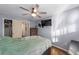 Bright bedroom featuring hardwood floors and a ceiling fan at 1416 Se 17Th Ave, Ocala, FL 34471