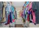 Large walk-in closet with ample hanging space and shelving at 1416 Se 17Th Ave, Ocala, FL 34471