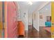 Bright entryway with hardwood floors and vintage furniture at 1416 Se 17Th Ave, Ocala, FL 34471