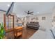 Open living room showcasing hardwood floors, modern kitchen, and a cozy seating area at 1416 Se 17Th Ave, Ocala, FL 34471
