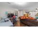 Home office with a desk, laptop, and comfortable seating area at 1416 Se 17Th Ave, Ocala, FL 34471