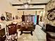 Living area with southwestern decor and wood beams at 1822 Ne 39Th Ct, Ocala, FL 34470