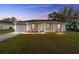 Brand new single story house with a gray roof and white exterior at 1877 Sw 150 Ct, Ocala, FL 34481