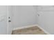 Laundry area with built-in shelving and vinyl flooring at 1877 Sw 150 Ct, Ocala, FL 34481