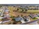 An aerial view of a home situated in a golf course community, offering scenic views at 2699 Nw 58Th Terrace, Ocala, FL 34482