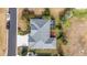 Overhead view of a single-Gathering home with a gray roof and a spacious backyard at 2699 Nw 58Th Terrace, Ocala, FL 34482