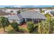 Aerial view of a home with a large backyard, screened lanai, and lush landscaping at 2699 Nw 58Th Terrace, Ocala, FL 34482