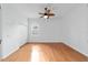 Spacious bedroom featuring hardwood floors and a ceiling fan at 2699 Nw 58Th Terrace, Ocala, FL 34482