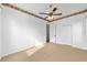 Bright bedroom with ceiling fan and carpet flooring at 2699 Nw 58Th Terrace, Ocala, FL 34482