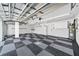 Spacious garage with epoxy flooring and ample storage at 2699 Nw 58Th Terrace, Ocala, FL 34482