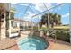 Relaxing hot tub with screened enclosure and deck access at 2699 Nw 58Th Terrace, Ocala, FL 34482