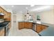 Island kitchen with stainless steel appliances and granite countertops at 2699 Nw 58Th Terrace, Ocala, FL 34482