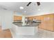 Open kitchen with large island and plenty of cabinet space at 2699 Nw 58Th Terrace, Ocala, FL 34482