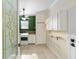Laundry room with washer, dryer, and built-in storage at 2699 Nw 58Th Terrace, Ocala, FL 34482