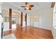 Hardwood floor living room with views to other rooms and sliding doors at 2699 Nw 58Th Terrace, Ocala, FL 34482