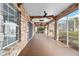 Covered porch with stone and wood details at 2699 Nw 58Th Terrace, Ocala, FL 34482