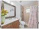 Nice bathroom with a shower/tub combo and wood vanity at 36 Cedar Tree Ter, Ocala, FL 34472