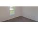 Bright bedroom with neutral walls and carpet at 3649 Sw 177Th Lane Rd, Ocala, FL 34473