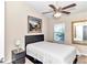 Bedroom with a full-size bed, nightstand, and ceiling fan at 4500 Sw 52Nd Cir # 104, Ocala, FL 34474