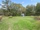 Large backyard with playset and open space at 58 Bahia Court Trak, Ocala, FL 34472