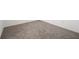 Empty bedroom with neutral colored carpeting at 5886 Sw 78Th Avenue Rd, Ocala, FL 34474