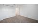 Well-lit bedroom with neutral carpeting and double door closet at 5886 Sw 78Th Avenue Rd, Ocala, FL 34474