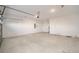 Spacious garage with ample storage space and an attached door at 5886 Sw 78Th Avenue Rd, Ocala, FL 34474