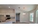 Bright dining room with bay window and chandelier at 7695 Sw 103Rd Loop, Ocala, FL 34476