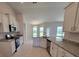 Modern kitchen with stainless steel appliances and granite countertops at 7695 Sw 103Rd Loop, Ocala, FL 34476