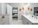 Double vanity bathroom with access to bedroom and shower at 8916 Sw 78Th Street Rd, Ocala, FL 34481