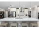 Modern kitchen boasting a large island and stainless steel appliances at 8916 Sw 78Th Street Rd, Ocala, FL 34481