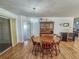 Bright dining room featuring a wood table and chairs at 9669 Se 174Th Place Rd, Summerfield, FL 34491