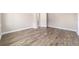 Spacious bedroom with hardwood floors and access to bathroom at 9725 Sw 108Th Terrace Rd, Ocala, FL 34481