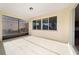 Screened patio with view of neighboring houses at 9725 Sw 108Th Terrace Rd, Ocala, FL 34481