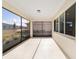 Covered screened porch with access to backyard at 9725 Sw 108Th Terrace Rd, Ocala, FL 34481