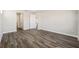 Spacious bedroom with neutral walls and wood-look flooring at 9739 Sw 79Th Lane Rd, Ocala, FL 34481