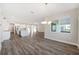 Open dining room with view into kitchen and living areas at 9739 Sw 79Th Lane Rd, Ocala, FL 34481