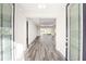 Bright entryway with wood-look floors and double doors at 9739 Sw 79Th Lane Rd, Ocala, FL 34481