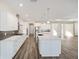 Modern kitchen with white cabinets and large island at 9739 Sw 79Th Lane Rd, Ocala, FL 34481