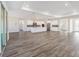 Modern kitchen features a large island and stainless steel appliances at 9739 Sw 79Th Lane Rd, Ocala, FL 34481