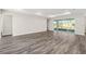 Spacious living room with sliding glass doors leading to the backyard at 9739 Sw 79Th Lane Rd, Ocala, FL 34481