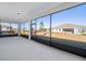 Spacious screened porch with view of backyard and other homes at 9739 Sw 79Th Lane Rd, Ocala, FL 34481